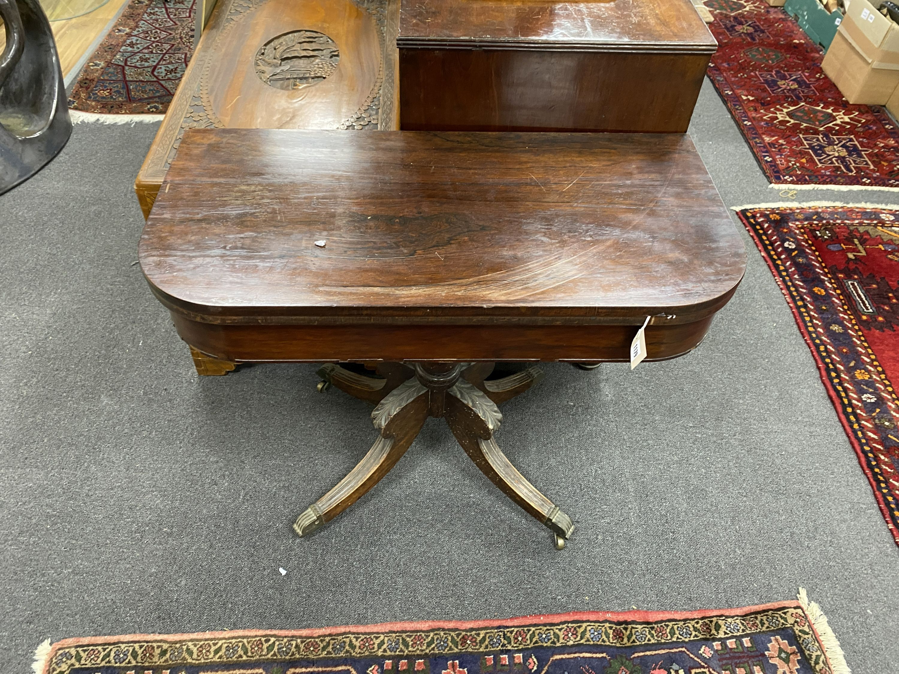 A Regency rosewood D shaped folding tea table, width 91cm, depth 45cm, height 72cm